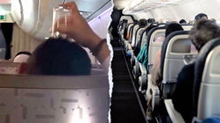 Passenger's bizarre use of drinking glass on flight leaves travelers horrified Accountants Canberra